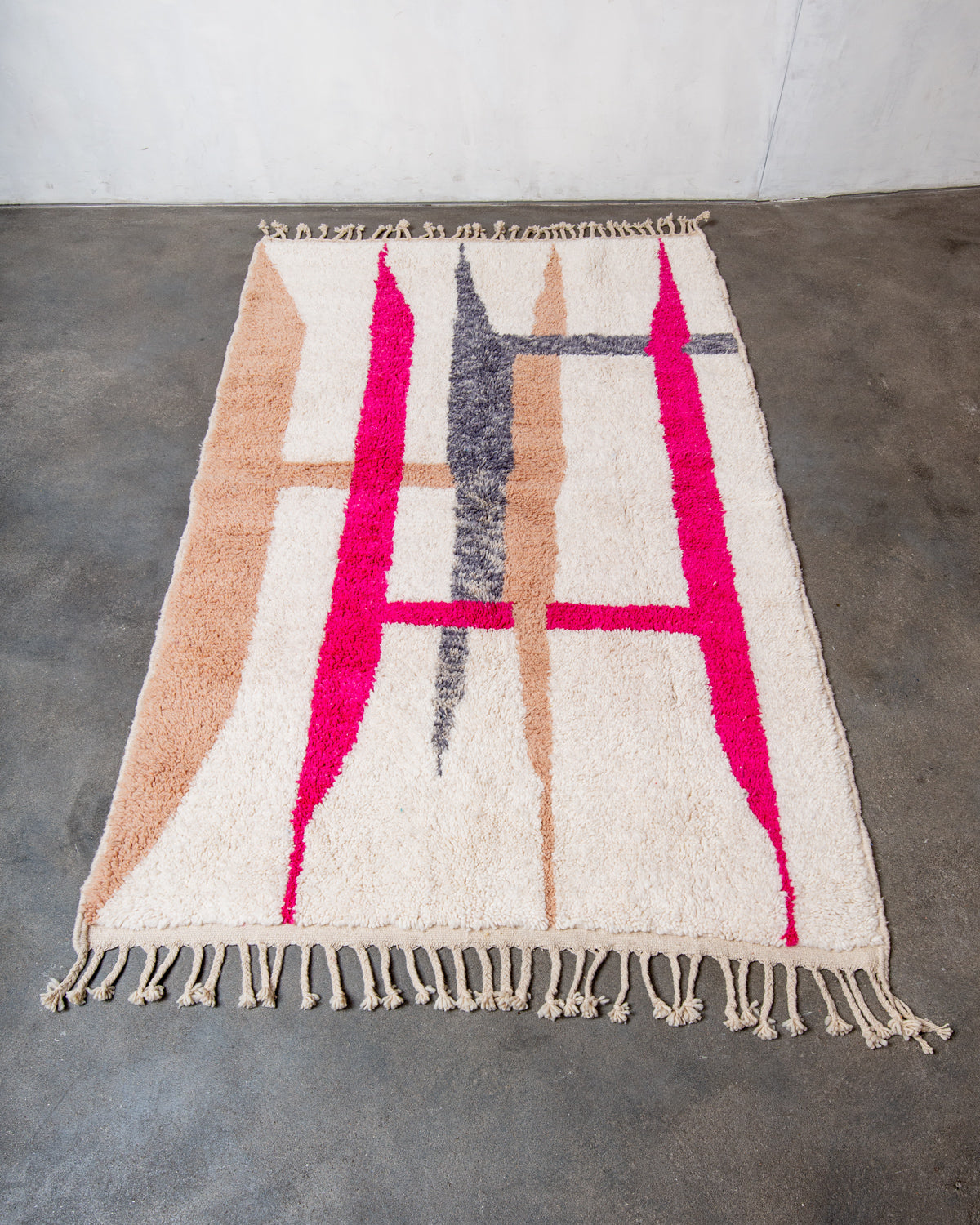 Modern, designer, handcrafted Berber rug from Morocco. Beniourain carpet with beautiful colours and patterns and fluffy wool texture.